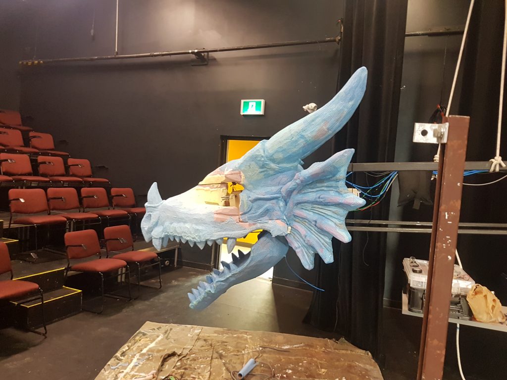 An unfinished dragon puppet head on display during march break made by Erindale Theatre at the University of Toronto Mississauga