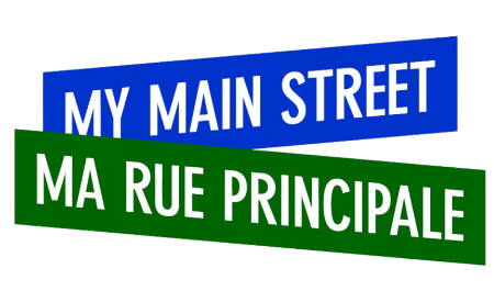 A blue banner with "My main street" written on it, and a green banner underneath with "Ma rue principale" written on it.