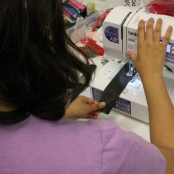 Live events in Mississauga: Aditi sews a long black strap for Terror